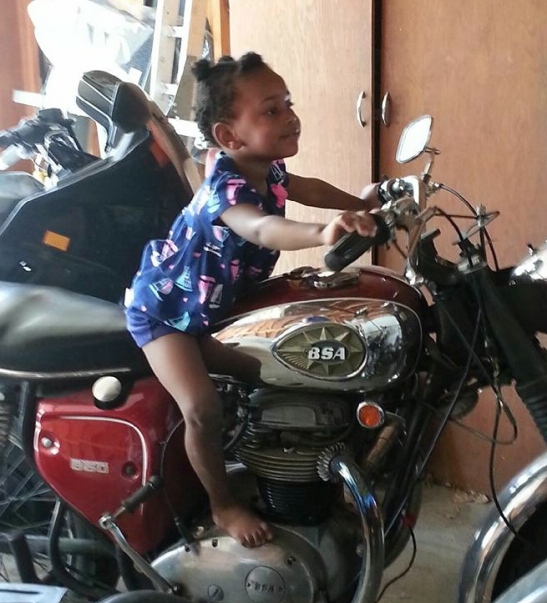 BSA Baby. My niece. No worries about her adorable feet. The bike isn't warm.